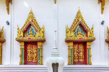Fototapeta premium close up windows bass-relief in Beautiful temple Wat Samai Kongka on Ko Pha Ngan, Thailand.