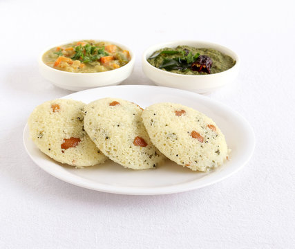 Rava idli or semolina cake, which is steam-cooked, is a traditional and popular south Indian vegetarian food.