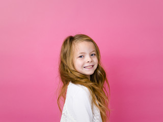 portrait of blond pretty girl in front of pink background with different emotions