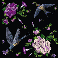 Embroidered seamless floral pattern of the traditional Japanese style. Swallows and roses on a black background. Can be used for the design of clothing, textiles and manufacturing