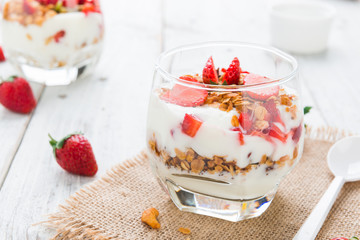 Strawberry , granola and yogurt healthy breakfast parfait