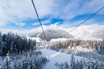 Fotobehang View from gondola lift to city Werfenweng and Tennen mountains © photoflorenzo