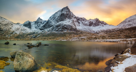 Under the sunset lights Flakstadøya, Flakstad, Lofoten Islands, Norway, Europe