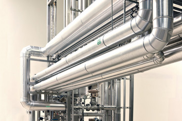 Industrial zone - steel pipelines and equipment of a factory // Rohrleitungen in einem Pharmawerk