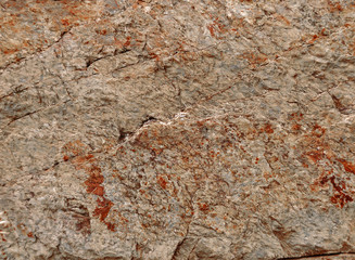 Background of a natural stone. Surface of the stone.