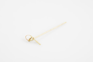 a cocktail sticks on white background
