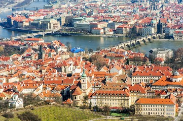 Fototapeta na wymiar Prague panoramic aerial view of the cityscape with Charles bridge and Vltava river, Czech Republic