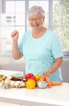 Elderly lady eating healthy
