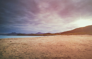 Sandy beach at Mellon Udrigle looking out over Gruinard Bay and the mountains around Ullapool. North West Highlands of Scotland.