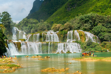 Amazing Ban Gioc waterfall flow down fluted in Cao Bang province, Vietnam.  Ban Gioc waterfall is...