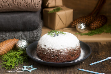 Christmas cake or pudding in festive decoration.