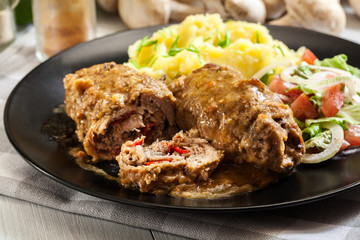 Pork rolls in sauce