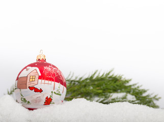 hand painted christmas ball in the snow