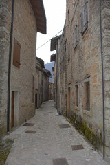 Fototapeta na wymiar A small street in the hill village of Erto in Friuli Venezia Giulia, north east Italy.
