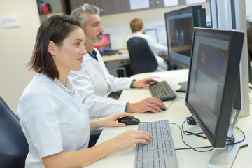 Female technician using computer