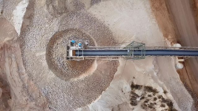 Stone grinder in a large Quarry - Top down aerial view