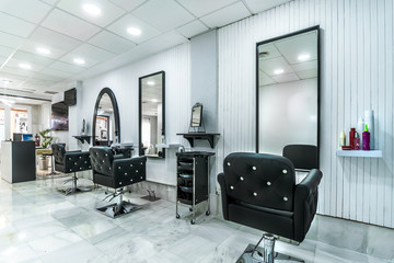 Modern bright beauty salon. Hair salon interior business - obrazy, fototapety, plakaty