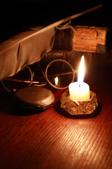 Lighting Candle Near Clock