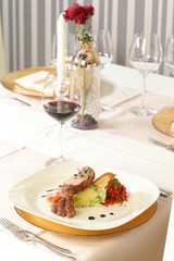 Restaurant meal, meat dish and vegetables plating