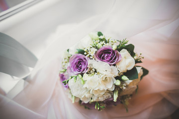 Beautiful wedding bouquet with different flowers, roses