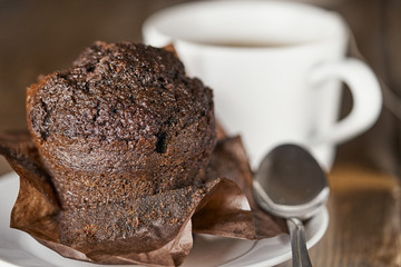 Chocolate muffin with a cup of tea