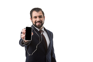 businessman with smartphone and earphones
