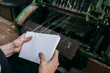 Worker binding paper sheets