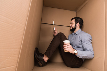 man with tablet and coffee
