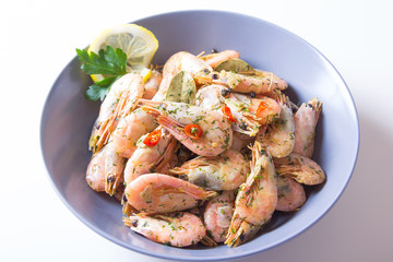 Shrimps fried with garlic and chili. Close-up, selective focus.