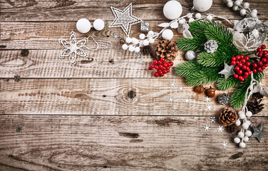 Christmas card with firtree pinecone and glass balls on old