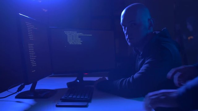 hackers using computer program for cyber attack