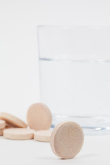 Fizzy tablets with glass of water