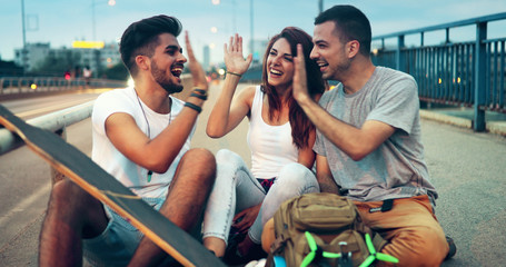 Group of happy friends hang out together