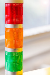 Old process indicator signaling device with different colors, orange, red, green