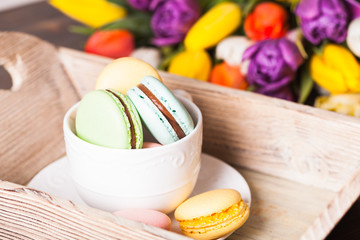Color macaroons in a cup