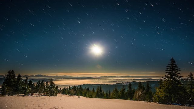 Moon and stars time lapse in Carpathian Mountains