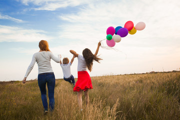 Family walking on the field