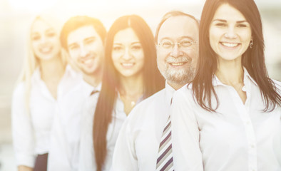 concept of team work-professional business team standing next to each other