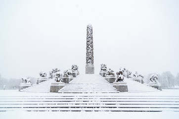 OSLO January 2015. Snow fall in Vigeland sculpture park or Vigelandpark in Oslo Norway. Vigeland is...