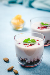 Yogurt fruit granola trifle. Healthy breakfast. Selective focus, copy space.