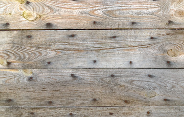 Old boards with rusty nails.