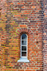 brick building round windows