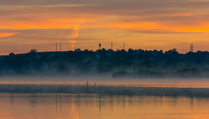 Fototapeta na wymiar Foggy river morning