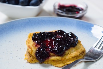 Homemade crumpet with blueberry jam