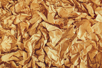 Background of old crumpled colored parchment paper