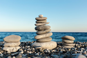  Seashore background with stone construction concept of balance and harmony