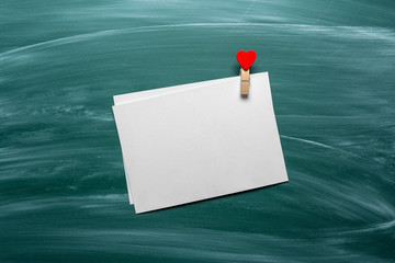 Empty card fot text on a green chalkboard