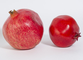 Real garnet and pomegranate garnet, on white background, close-up.