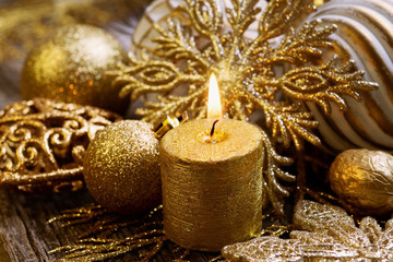 Gold christmas decoration with candle