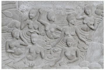 Stone carving sclupture group of naked women showering taking a bath in warm external water bathroom isolated on white backgrounds, home decoration, thai culture crafting sourvenir, wallpaper